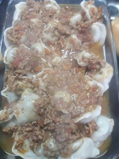 Una foto de Agnolotti de verdura con salsa boloñesa para mi amiga