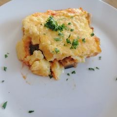 A picture of Eggplant and mushroom polenta bake.
