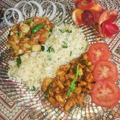 A picture of Soya chicken with Coriander rice and potato bhujiya.
