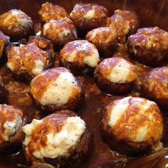 A picture of Enchilada Stuffed Mushrooms.