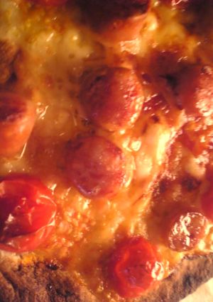 A picture of Mini Tomato and Bacon Tortilla Pizza.