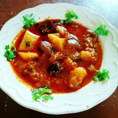 A picture of Brinjal potatoes and tomato sabji(no onion no garlic).