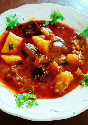 A picture of Brinjal potatoes and tomato sabji(no onion no garlic).