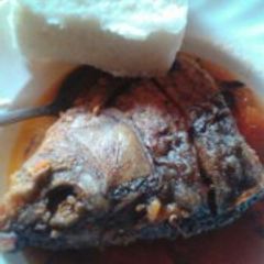 A picture of Nile Perch stew and Ugali.