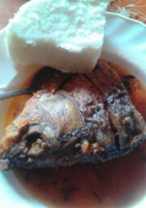 A picture of Nile Perch stew and Ugali.