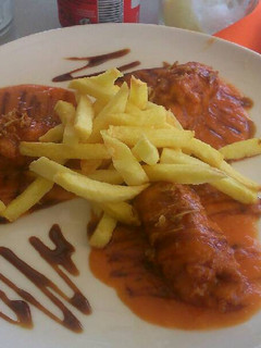 Una foto de Rollitos de lomo con miel de caña