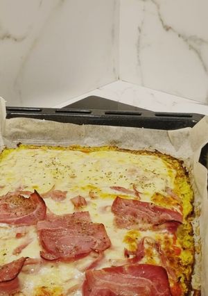 Una foto de Pizza fit con base de calabacín