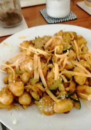 A picture of Gnocchi over chesse.