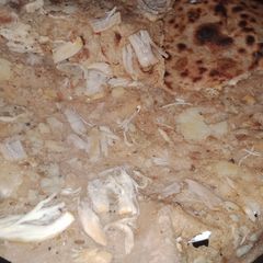 Steam chicken with potatoes paratha A picture of Steam chicken with potatoes paratha.