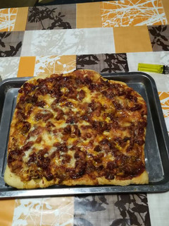 Una foto de Pizza al estilo marroquí