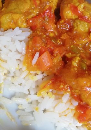 Una foto de Arroz con queso y salsita de carne de cerdo