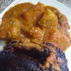 A picture of Yam porriage with smoked fish.