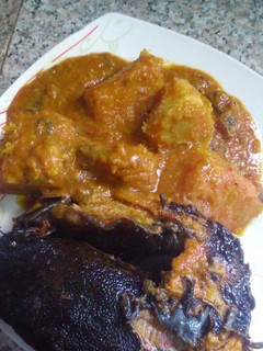 A picture of Yam porriage with smoked fish.