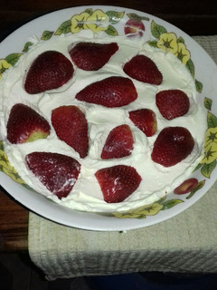 Una foto de Frutillas en crema doble
