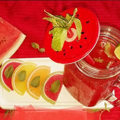 A picture of Watermelon Juice with mint and lemon.