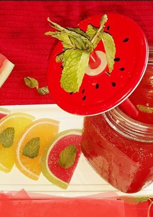 A picture of Watermelon Juice with mint and lemon.