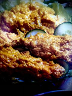 Una foto de Pollo con curry al horno o freidora de aire
