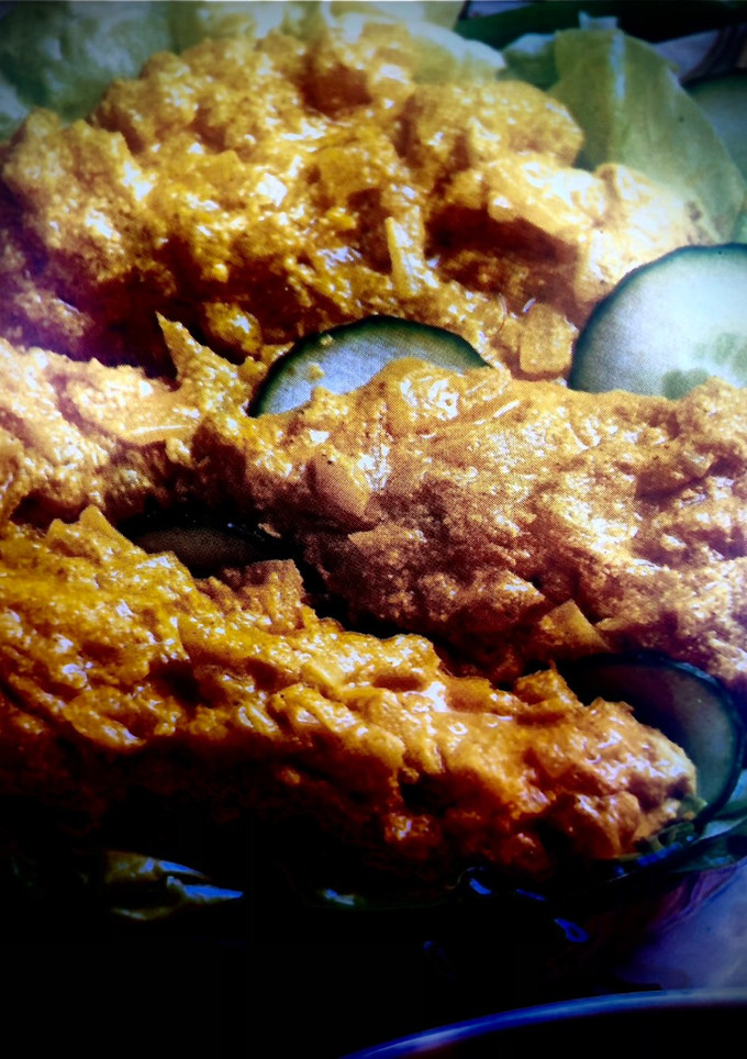Una foto de Pollo con curry al horno o freidora de aire