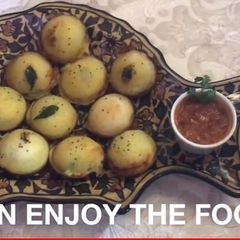 A picture of Chole stuffed uppam.