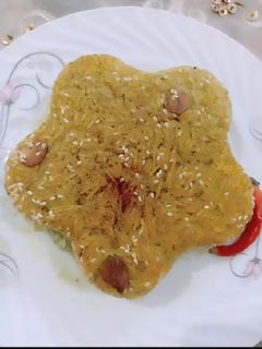 عکسی از دستور پلو تون ماهی قالبی با ته دیگ سیر وکنجد و زعفران