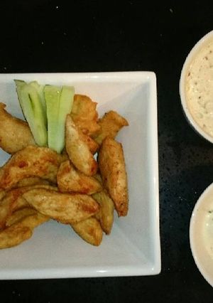 Una foto de Pollo frito con aderezo de albahaca