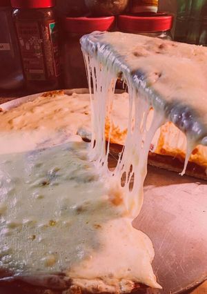 Una foto de Pizza de masa con menos harina blanca