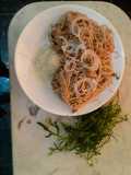 Spaghetti con rúcula