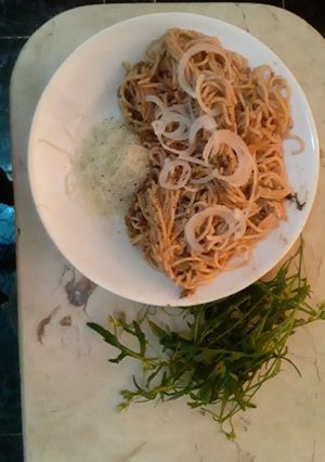 Una foto de Spaghetti con rúcula