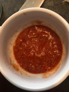 A picture of Tomato sauce for baked fish.