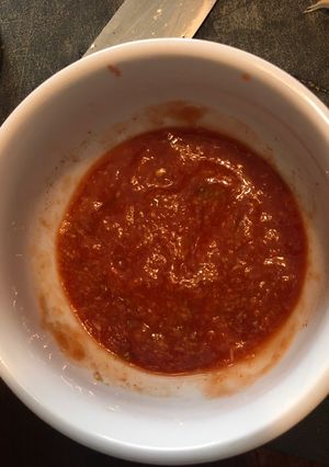 A picture of Tomato sauce for baked fish.