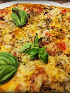 Una foto de Pizza Calabresa