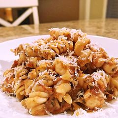 A picture of Roasted heirloom tomato mozzarella pasta.