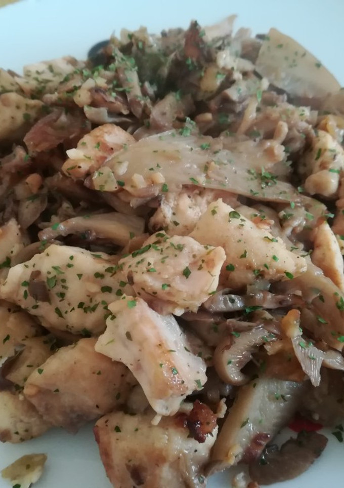 Una foto de Setas concha con pescaito al ajito