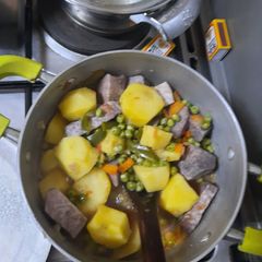 A picture of Nduma and Potatoes mix.