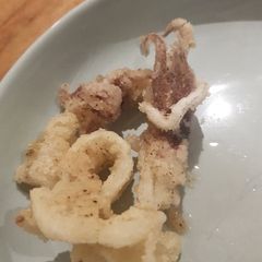 A picture of Salt 'n Pepper Squid with stir fry vegetables.