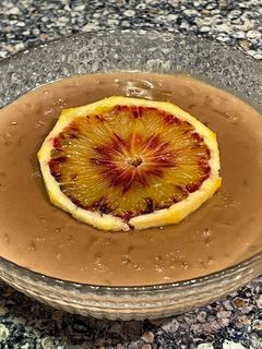 Una foto de Arroz con leche de chocolate y naranja sanguina