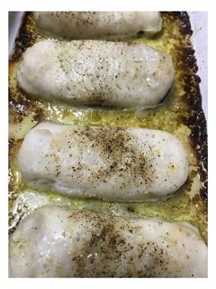 Una foto de Merluza al horno con salsita