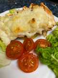 Carne de langosta a la parmesana al horno