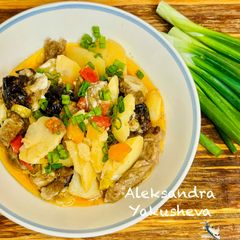 A picture of Baked Pork with Prunes and Vegetables.