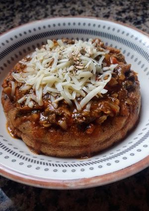 Una foto de Soufflé de berenjena con bolognesa de hongos. Keto vegetariano