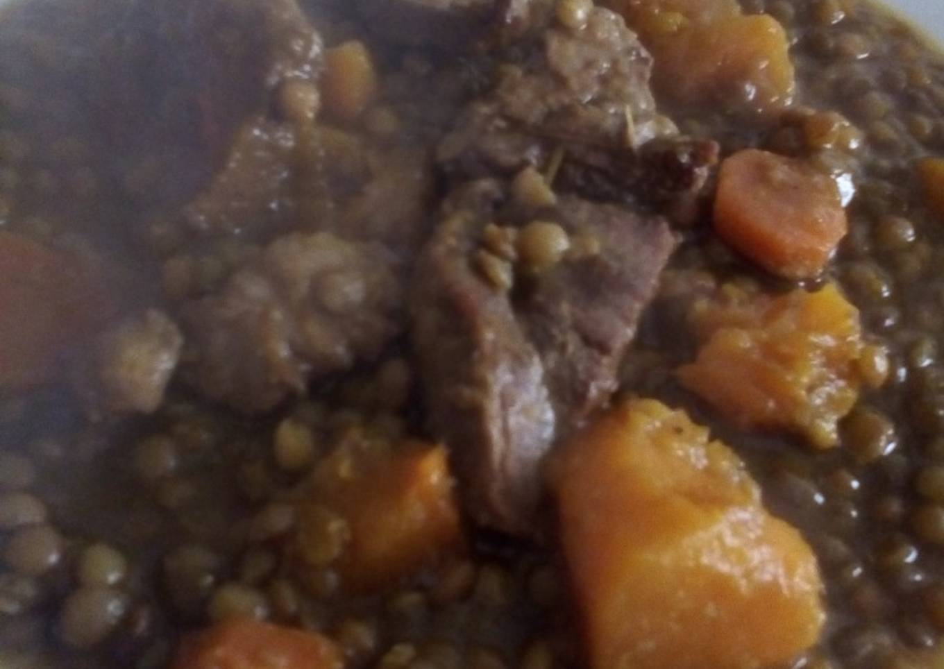 Guiso de lentejas con corbata ibérica