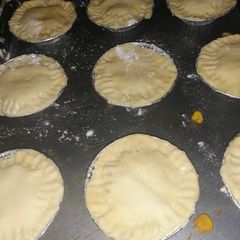 A picture of Cheese and sweet corn mini pies.