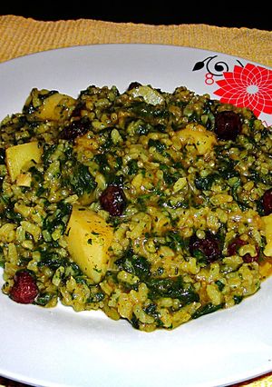 Foto principal de Ortigas con arroz y arándanos deshidratados