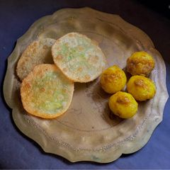 A picture of Motorsuti Kochuri o Aloo Dum, a Bengali wintry classic.