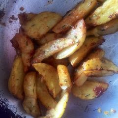 Garlic & Thyme Potato Wedges A picture of Garlic & Thyme Potato Wedges.