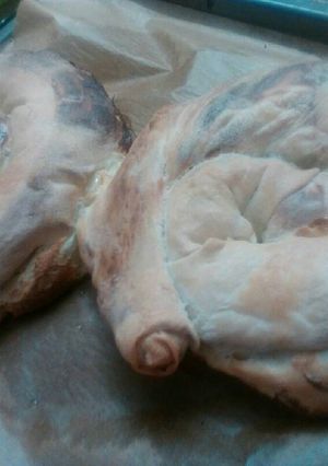 Una foto de Placinte de brinza o Empanada moldava de queso