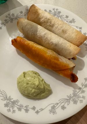A picture of Fully loaded pork taquitos.
