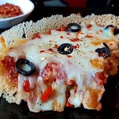 A picture of Ghevar Pizza.