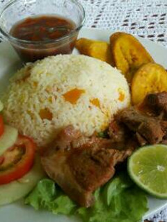 Una foto de Almuerzo Corriente con arroz de auyama (Calabazas)