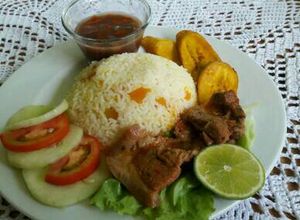 Una foto de Almuerzo Corriente con arroz de auyama (Calabazas)
